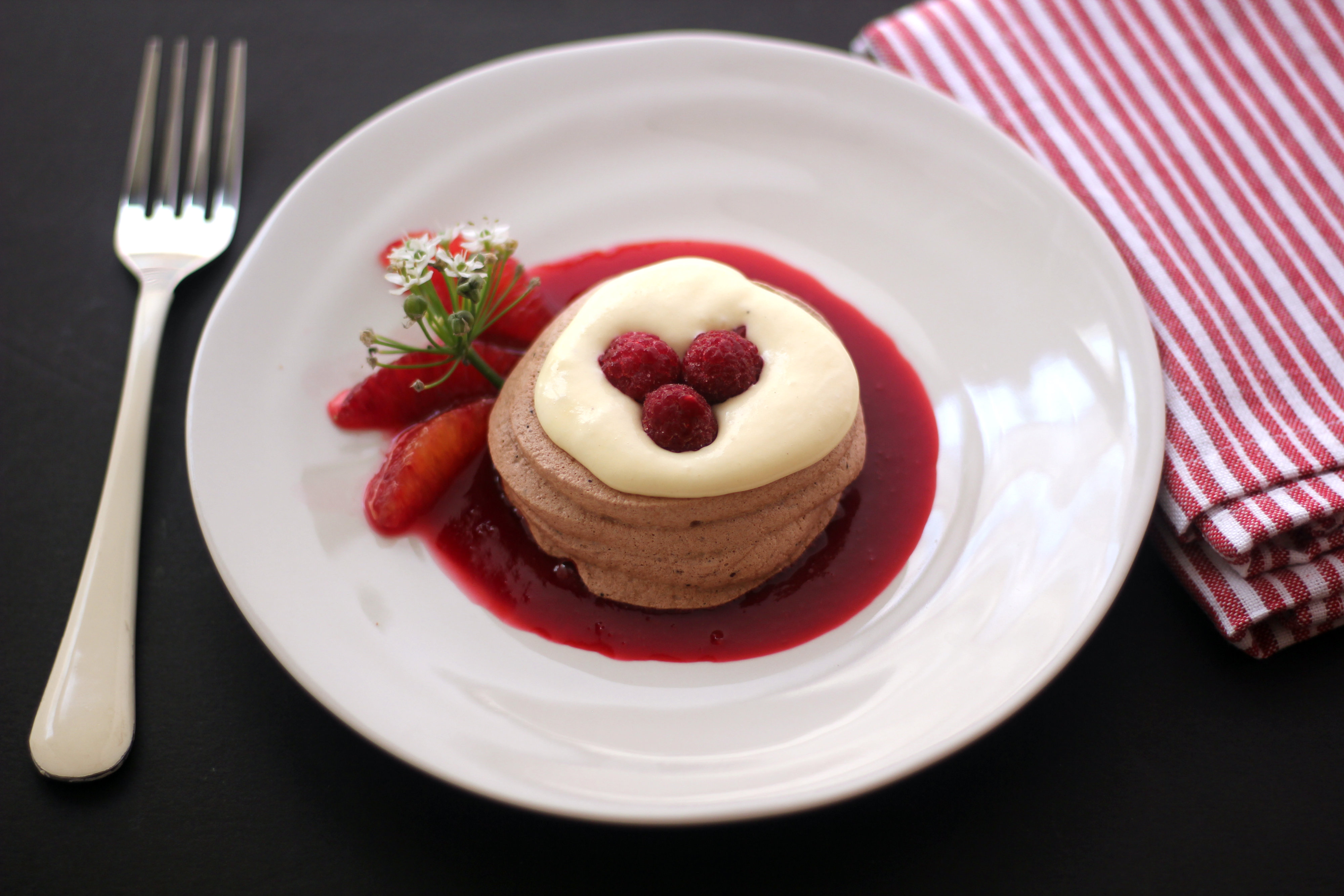 White Chocolate Mousse In Chocolate Meringue Shells With Raspberry